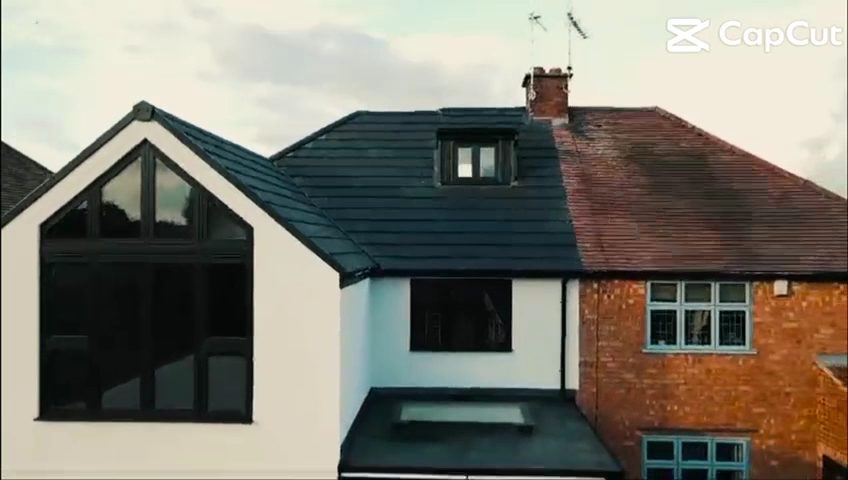 Rendered dormer bungalow with dark tiles