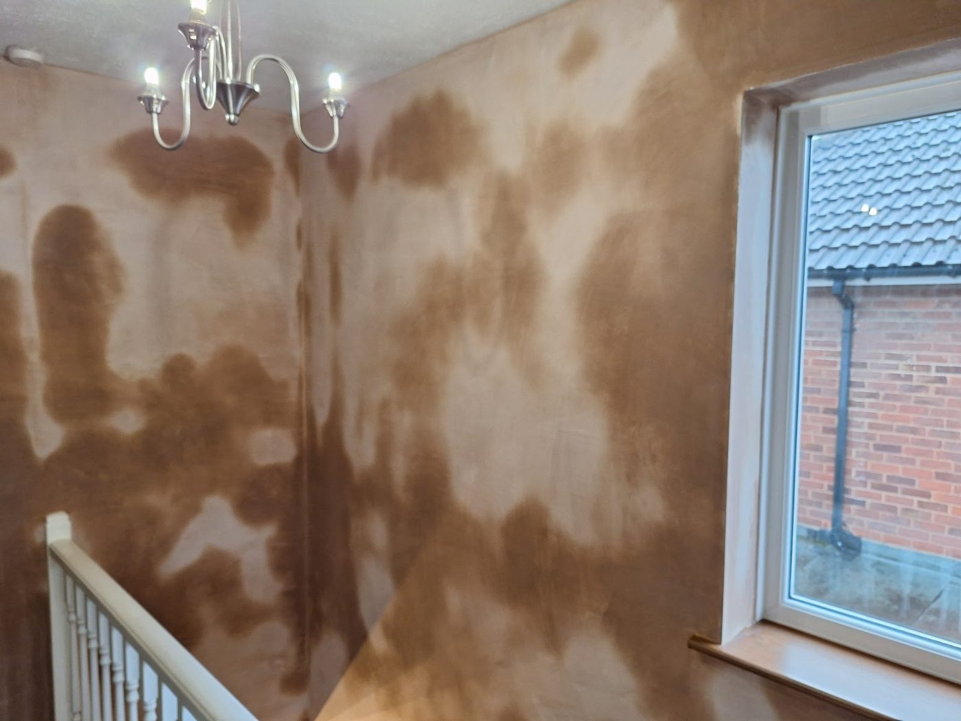 Hall corner with fresh plaster